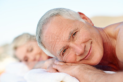 Buy stock photo Portrait, massage and old man in outdoor spa for smile, relax and marriage anniversary for trip. Love, luxury resort and elderly couple with senior people for stress relief, holiday or vacation