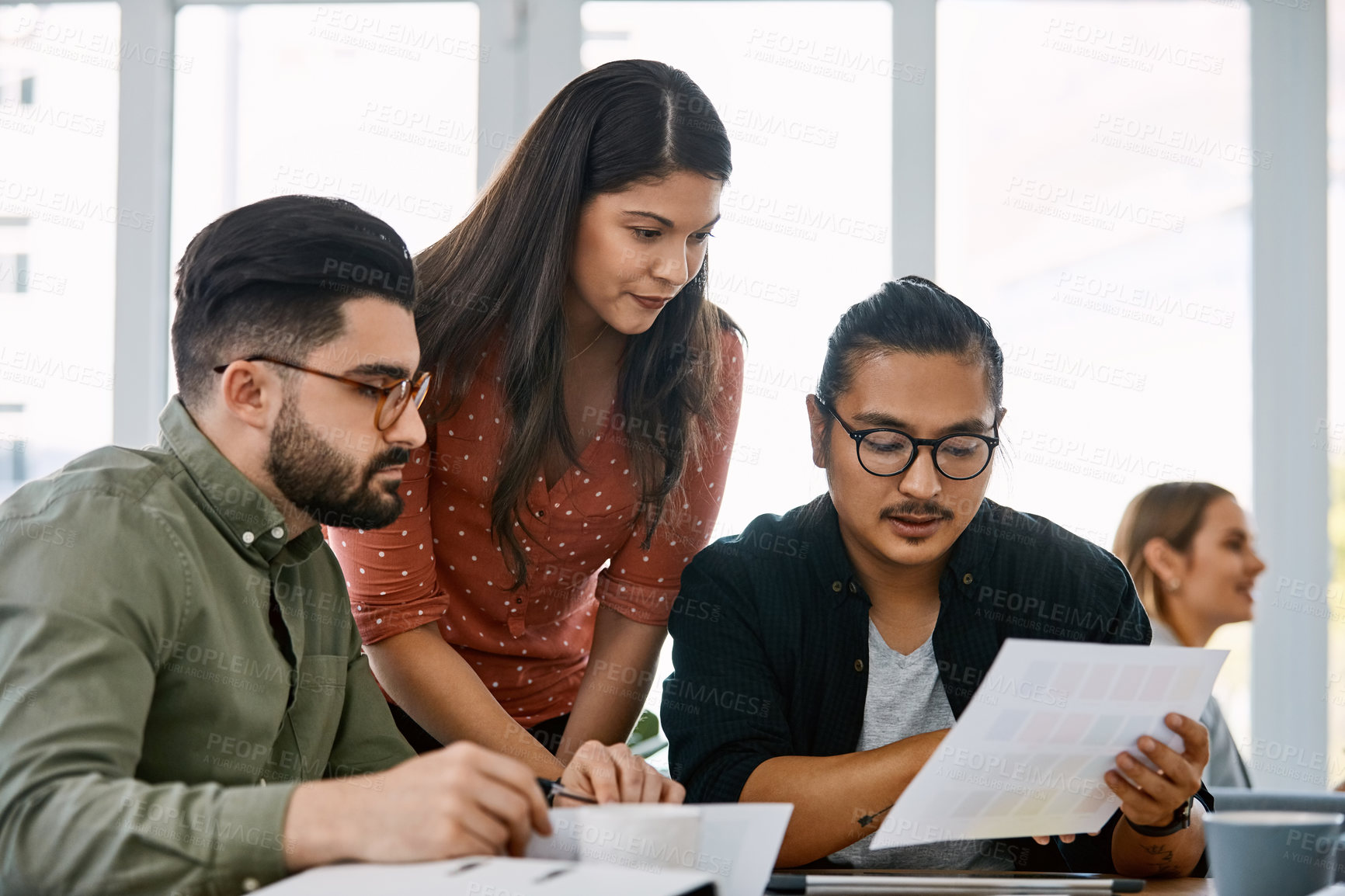 Buy stock photo Creative, discussion or team in office with color swatch, logo plan or ad development in campaign. Feedback, people or brand specialist with paper, design review or market strategy for company growth