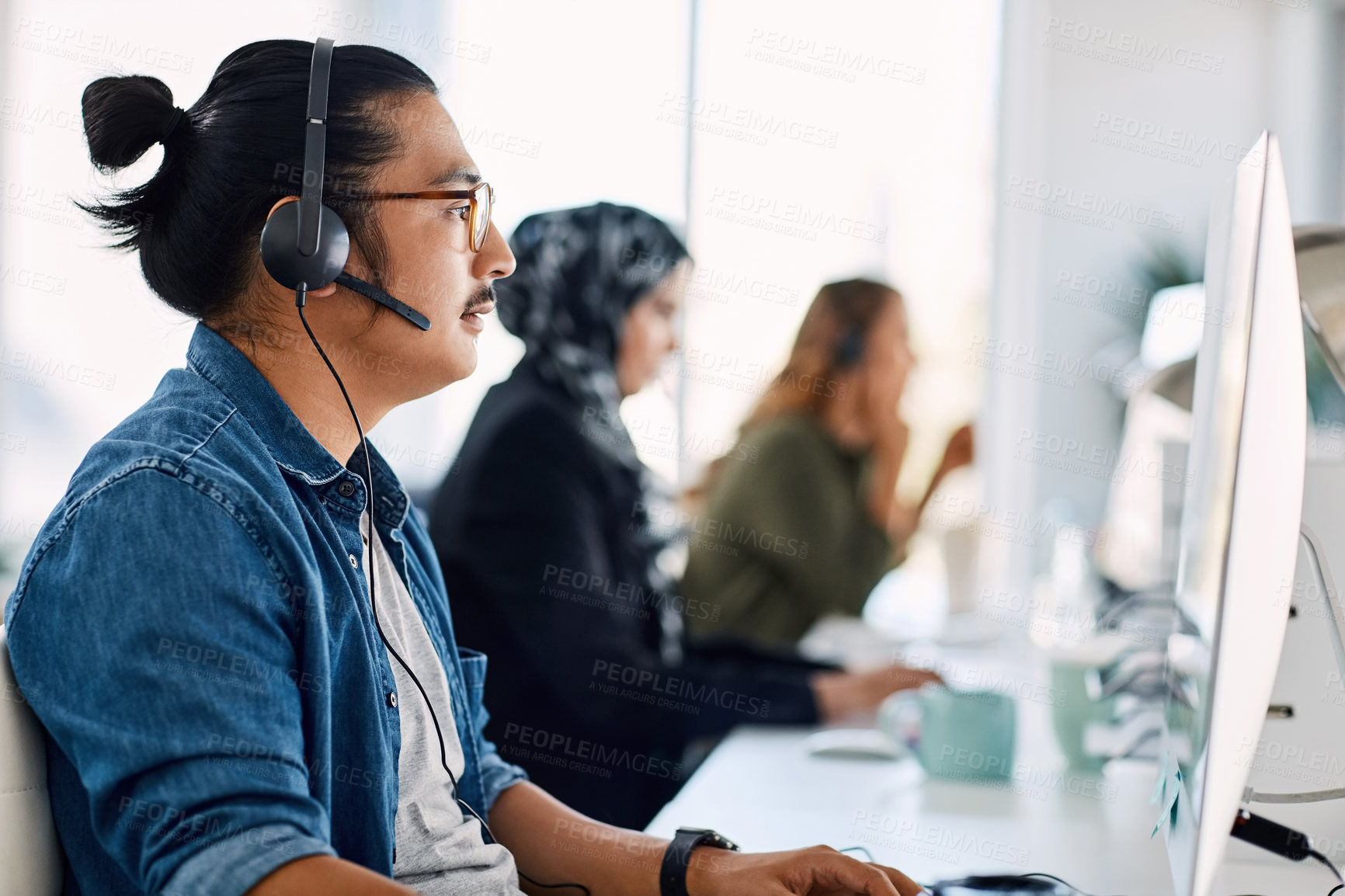 Buy stock photo Office, call center and man with headset, computer and team for customer service, help and faq. Coworking, telecommunication and person with mic for online consulting, crm support and contact us
