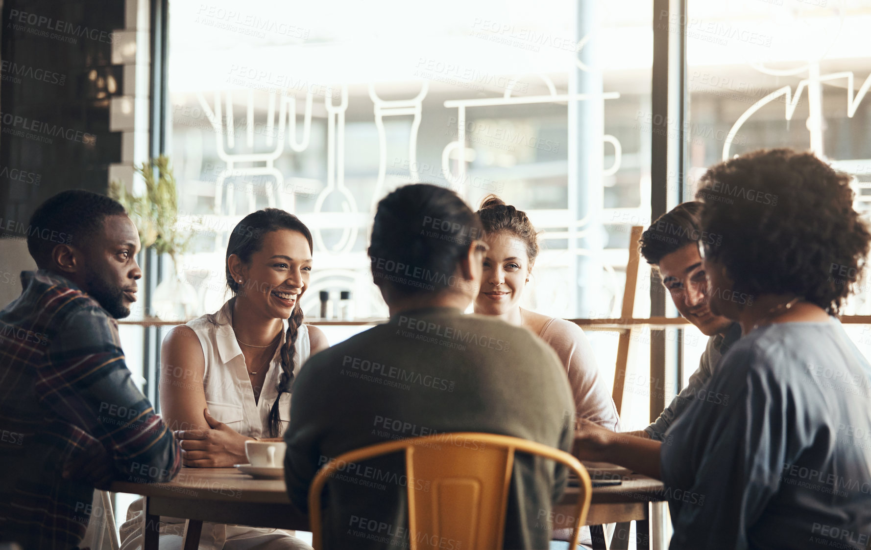 Buy stock photo Friends, chat and laughing with coffee in cafe, social gathering and discussion with group on break. Happy people, hangout and conversation with latte, connection and relax together in restaurant