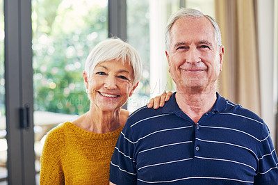 Buy stock photo Shot of a happy senior couple spending time together at home
