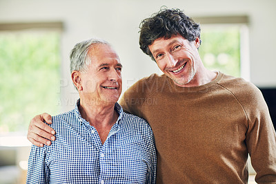 Buy stock photo Portrait of a mature man and his elderly father spending quality time at home