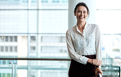 Buy stock photo Cropped portrait of an attractive businesswoman standing in her office