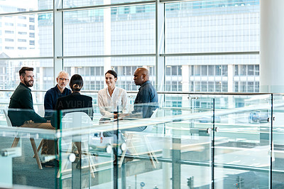 Buy stock photo Full length shot of a group of businesspeople during a meeting at work