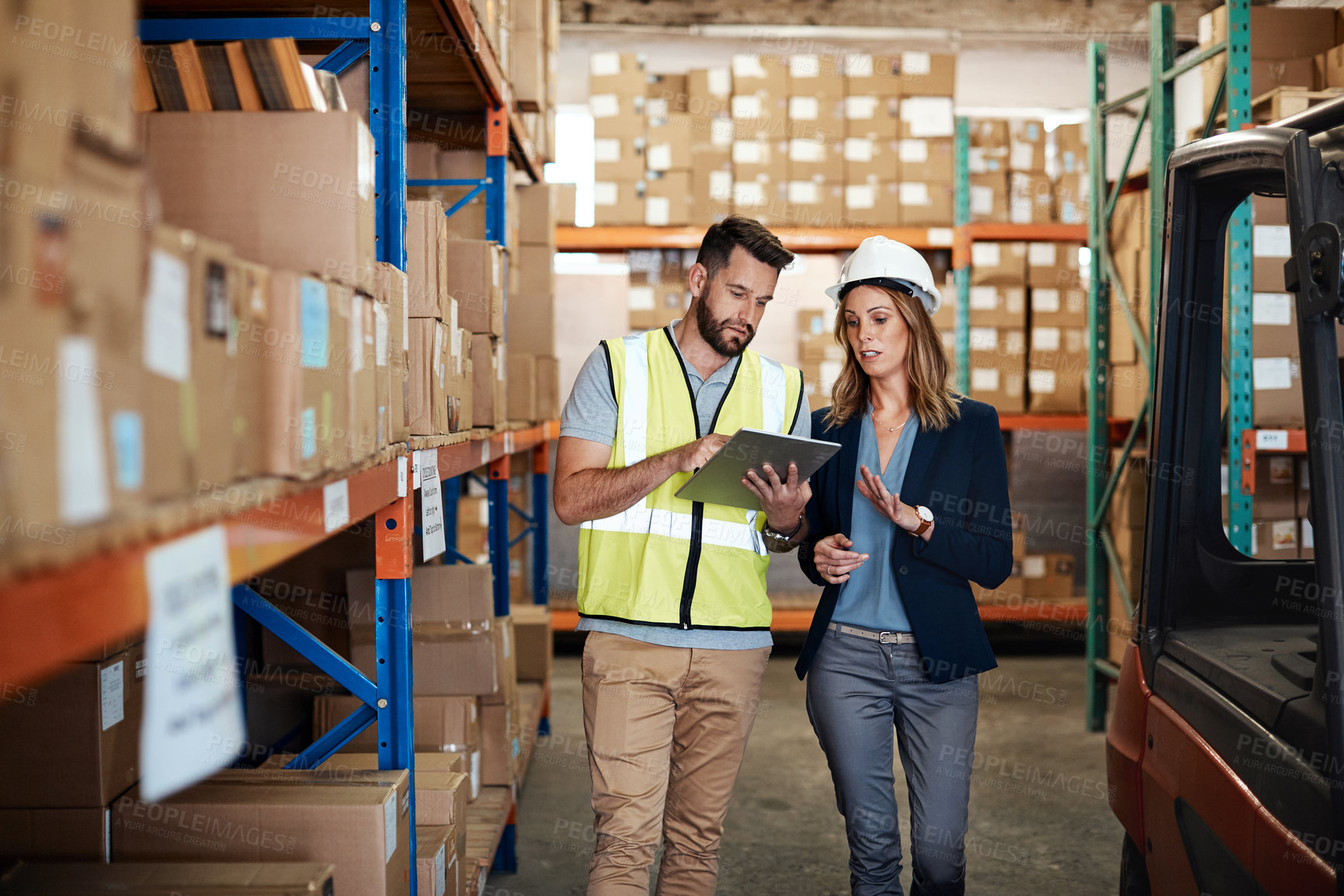 Buy stock photo People, reading and tablet in warehouse for logistics, supply chain and teamwork for distribution. Staff, talking and digital in storage for research, inventory update and collaboration for delivery