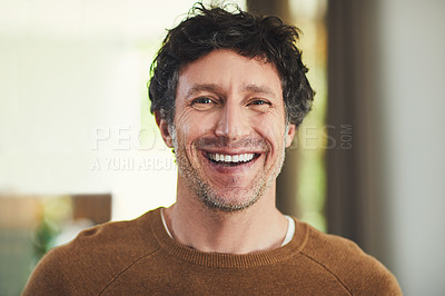 Buy stock photo Portrait of a confident mature man standing in his home