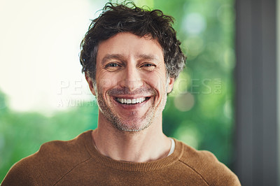Buy stock photo Portrait of a confident mature man standing in his home