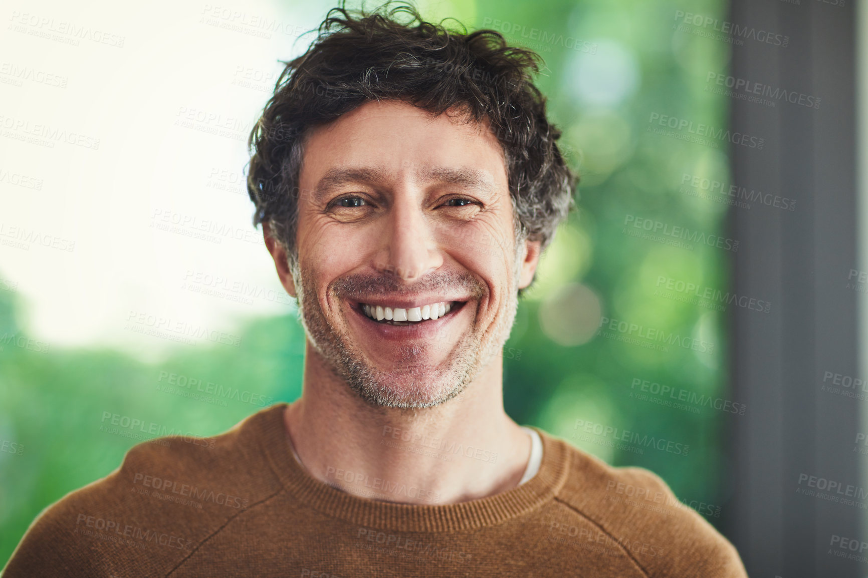 Buy stock photo Portrait of a confident mature man standing in his home