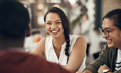 Buy stock photo Cropped shot of a young diverse group of friends sitting together and enjoying coffee in a cafe during the day