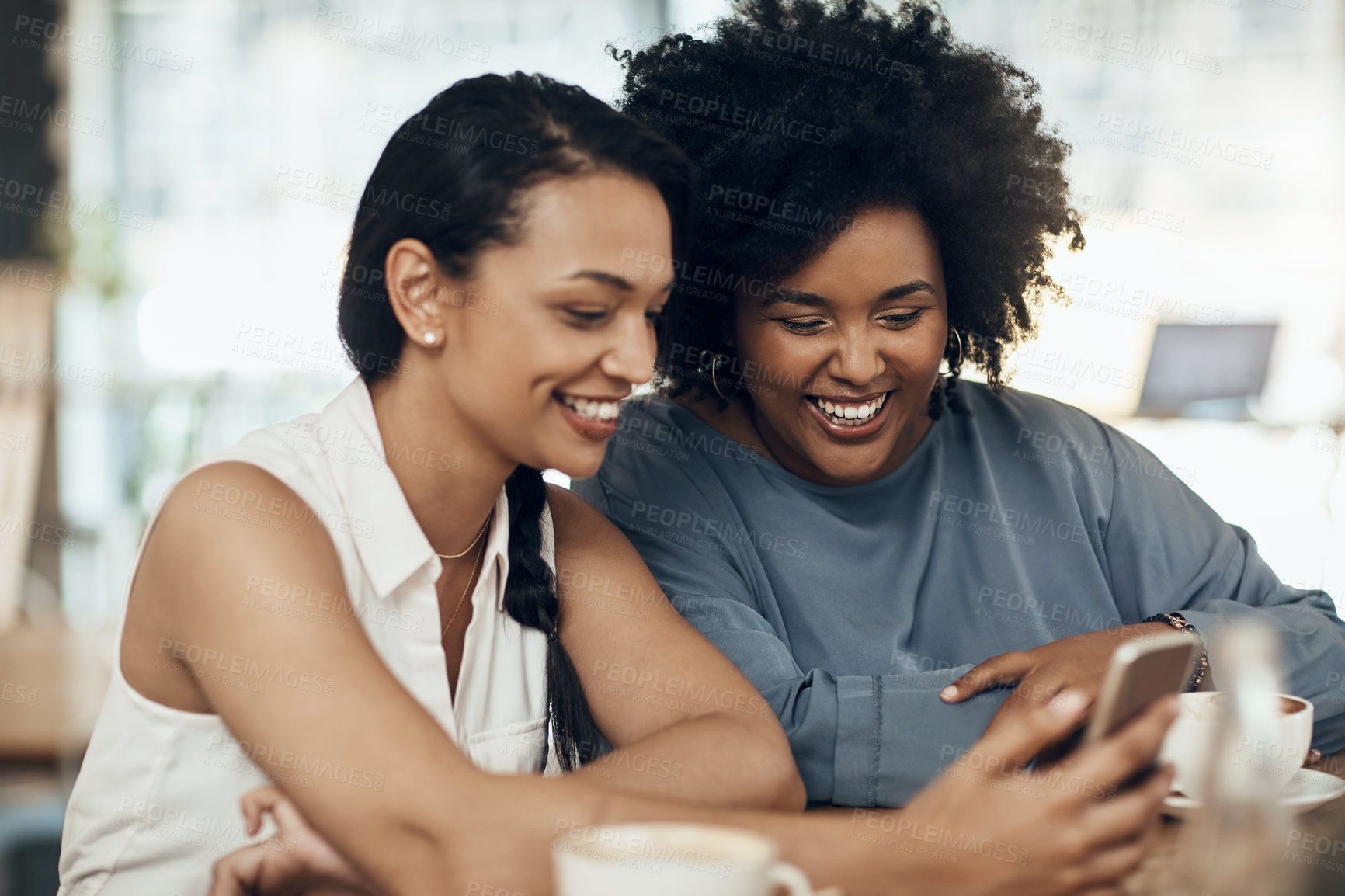 Buy stock photo Friends, laugh and women with phone in coffee shop,  streaming online and relax together on weekend. Happy people, bonding and chill with mobile, internet connection and watching funny video in cafe