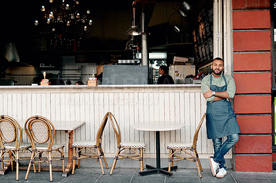 Buy stock photo Portrait of a young man standing outside his cafe