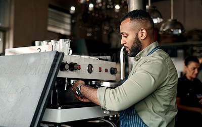 Buy stock photo Shot of a barista preparing coffee in a cafe