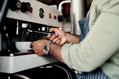 Buy stock photo Closeup shot of a barista preparing coffee in a cafe