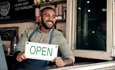 Buy stock photo Shot of a young man holding an 