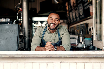 Buy stock photo Portrait of a young man working in a cafe