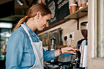 Grinding some fresh beans for a fresh cup