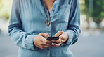 Checking her notifications while out and about