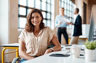 Buy stock photo Portrait of a confident young businesswoman working in an office
