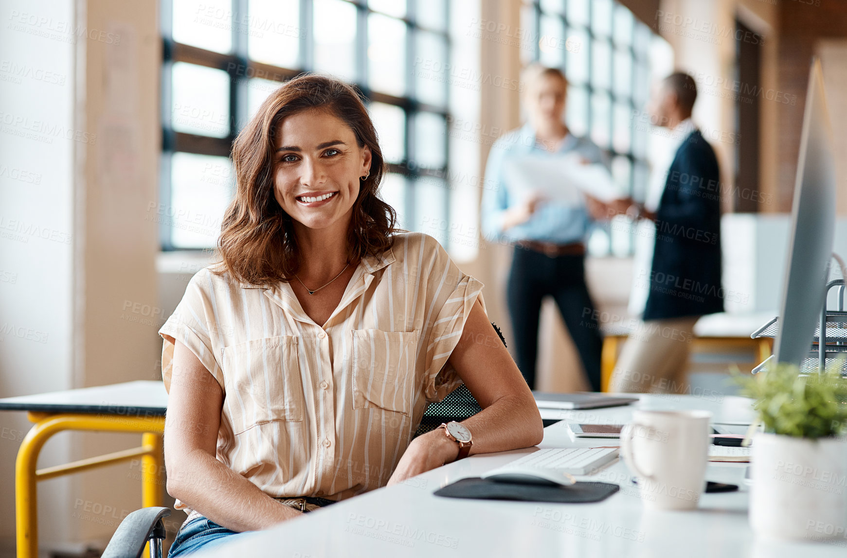 Buy stock photo Portrait of a confident young businesswoman working in an office