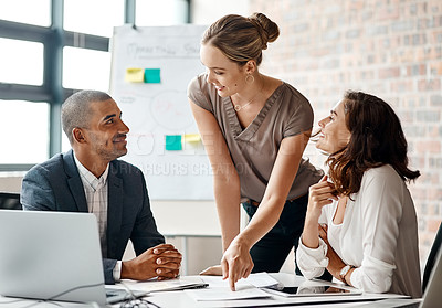 Buy stock photo Shot of a group of businesspeople having a meeting in an office