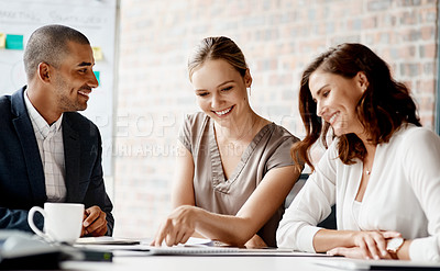 Buy stock photo Shot of a group of businesspeople having a meeting in an office