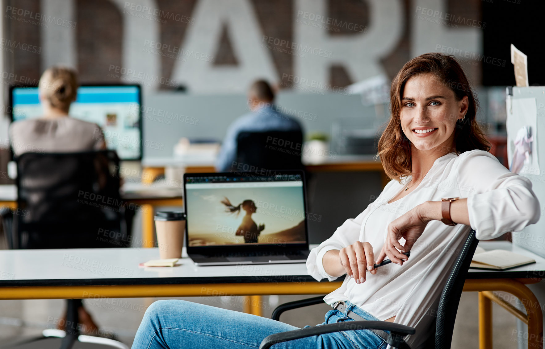 Buy stock photo Portrait of a confident young businesswoman working in an office