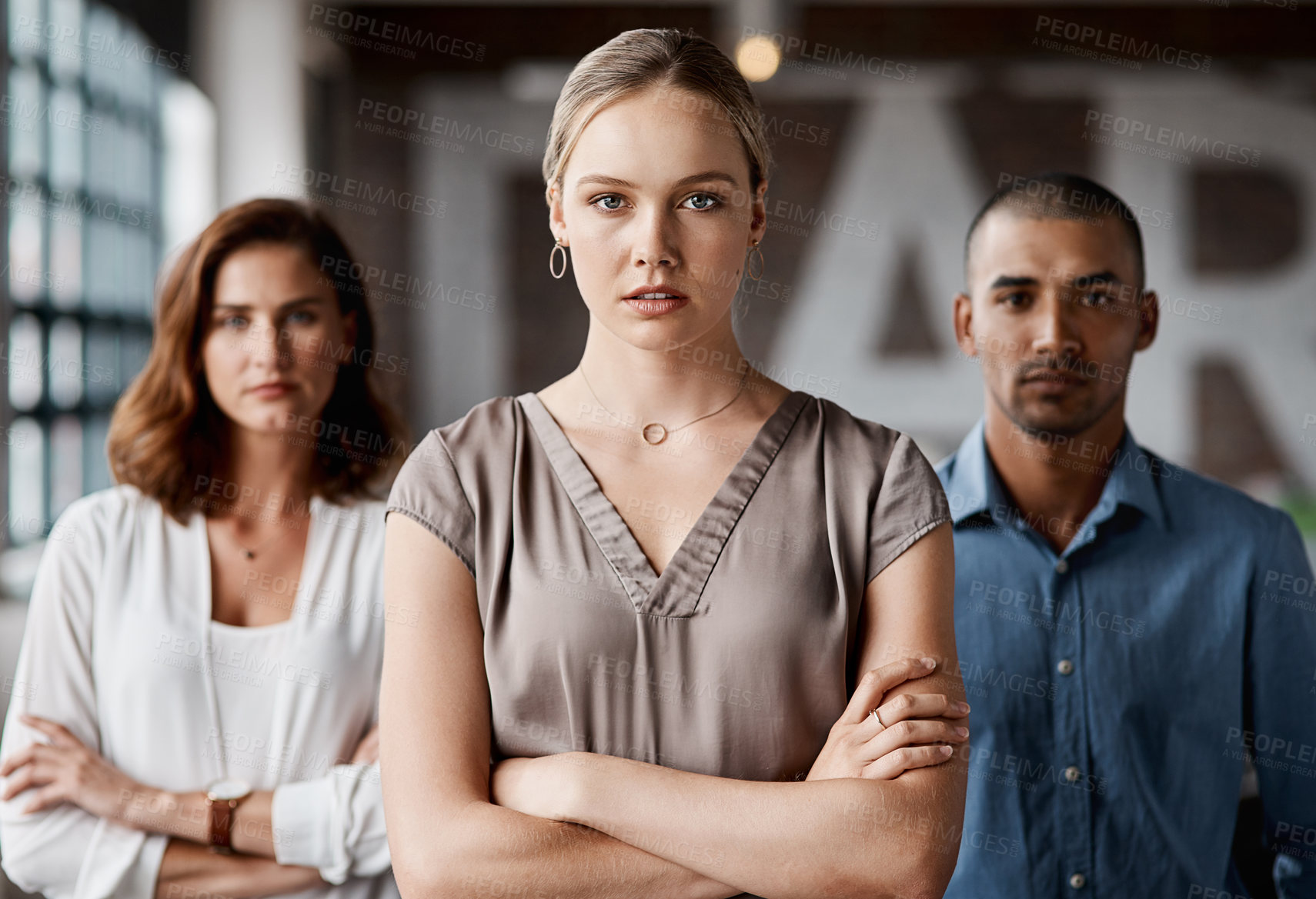 Buy stock photo Portrait of a group of businesspeople standing together in an office