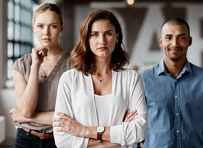Buy stock photo Portrait of a group of businesspeople standing together in an office