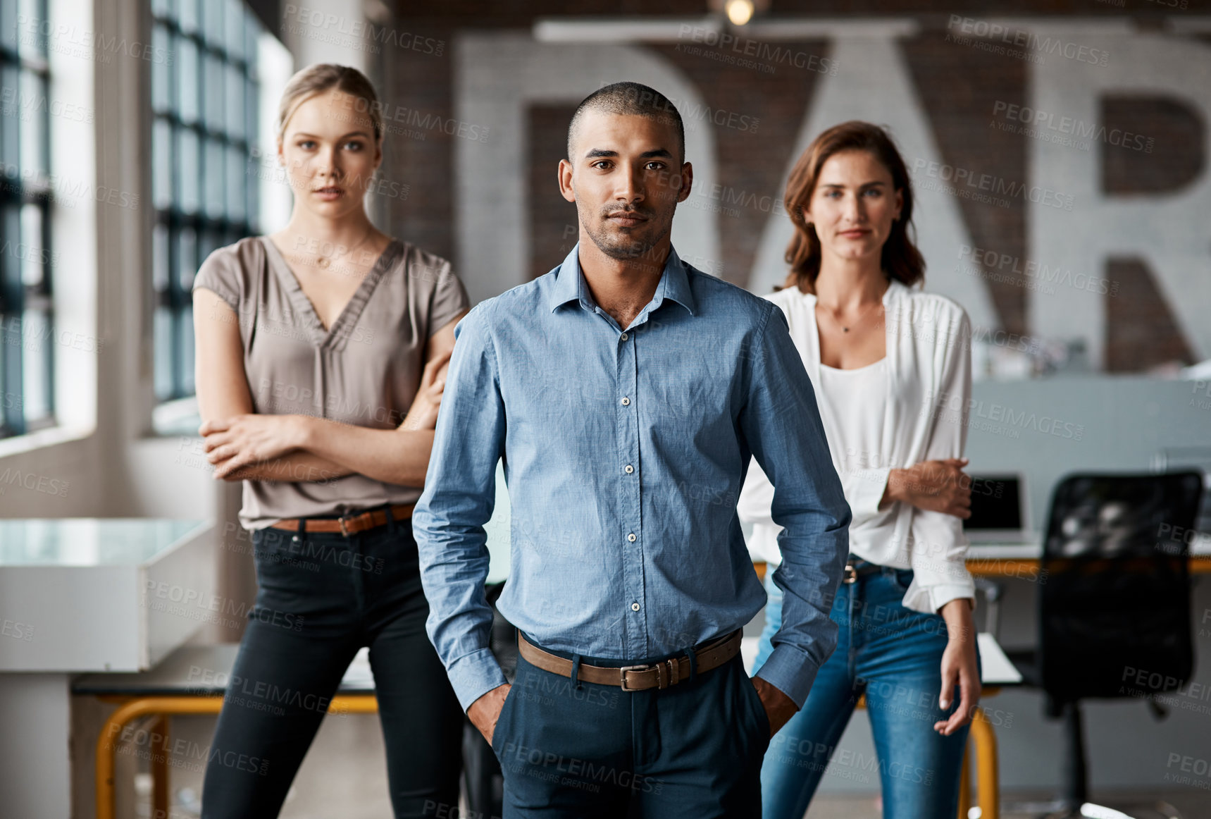 Buy stock photo Portrait of a group of businesspeople standing together in an office