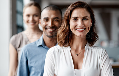 Buy stock photo Portrait of a group of businesspeople standing together in an office