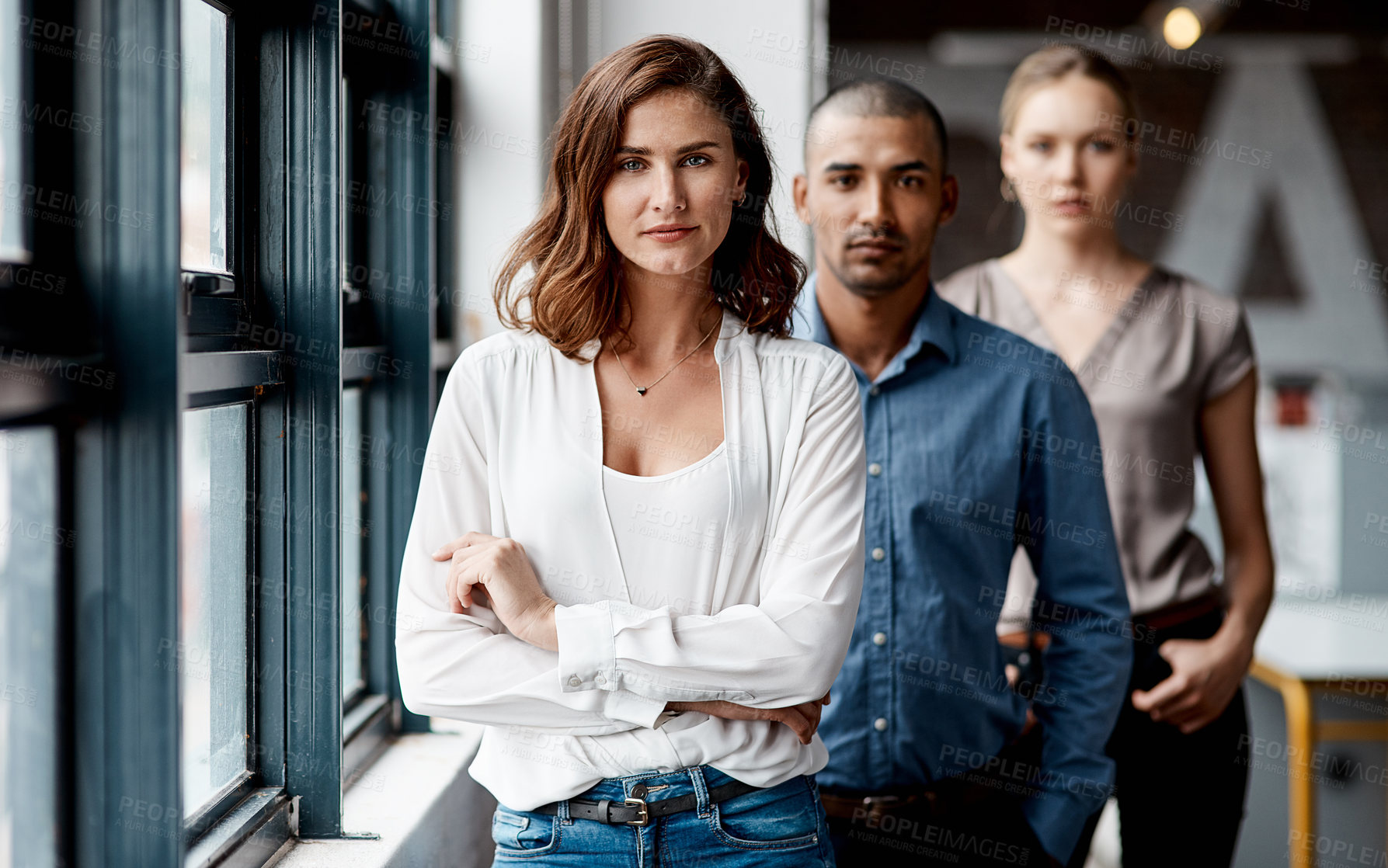 Buy stock photo Portrait of a group of businesspeople standing together in an office