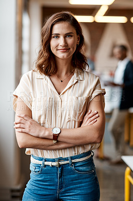 Buy stock photo Portrait of a confident young businesswoman working in a modern office