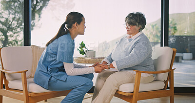 Buy stock photo Nurse, old woman and holding hands for help, health support and encourage with homecare. Caregiver, retirement and comfort with kindness in lounge for medical care, assisted living and trust at house