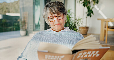 Buy stock photo Senior, woman and reading with book in home for garden tips, story or natural growth. Elderly, female person or glasses with novel of house plants for eco friendly development, guide or knowledge