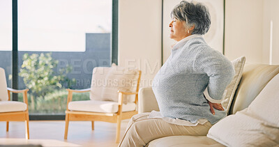 Buy stock photo Elderly, woman or back pain in home, injury or fibromyalgia with osteoporosis in living room. Discomfort, retirement or person with sore spine on sofa, arthritis or muscle tension with health problem