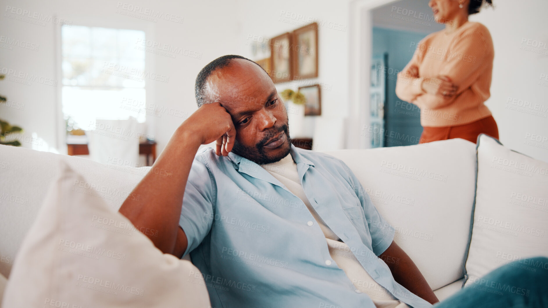 Buy stock photo Upset, fight and man with partner in home for argument, disagreement or separation. Disappointed, African couple or male person with stress for toxic relationship, dispute or conflict in house