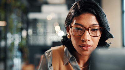 Buy stock photo Reading, glasses and businesswoman with laptop in office, lawyer or planning for trial with research. Serious, attorney and person with tech, online and hearing preparation with info in law firm