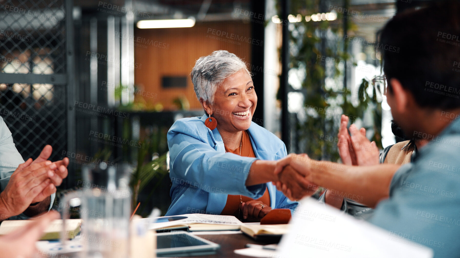 Buy stock photo Handshake, smile and business people with applause in office for meeting, collaboration or partnership. Happy, clapping and corporate employees shaking hands with client for b2b merger in workplace.