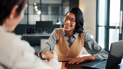Buy stock photo Business people, handshake and welcome with laptop for hiring, thank you or recruiting in office. Human resources, woman and shaking hands with smile, technology and team onboarding with meeting