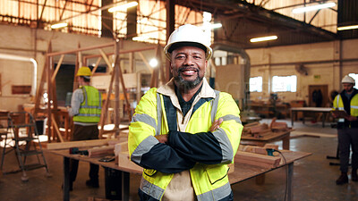 Buy stock photo Portrait, carpenter and man in workshop with arms folded for manufacturing, joinery or protection gear. Smile, woodwork and mature artisan with helmet for safety, confidence and production industry