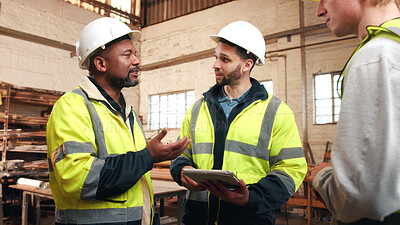 Buy stock photo Contractor, tablet and men in workshop for furniture, manufacturing and artisan planning. Woodworking, production and people in joinery factory with tech in warehouse for inspection and storage
