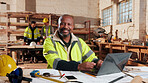 Portrait, carpenter and happy man at factory with laptop, joinery manufacturing and about us. Smile, woodwork and mature professional in workshop, confidence or pride in furniture production industry