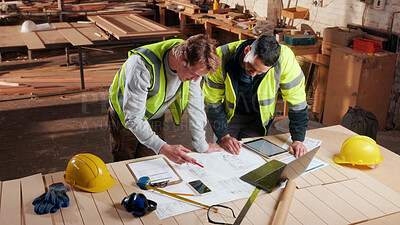 Buy stock photo Documents, laptop and people in workshop for carpentry, wood production and planning with design. Carpenter, contractor and men on tech for inventory, furniture and blueprint for woodworking project