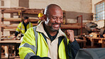 Excited, carpenter and man with laptop in workshop, fist pump and design approval on web or success. Woodworking, mature person and celebration for project, achievement and good news on computer