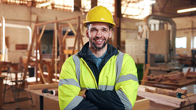 Buy stock photo Portrait, carpenter and man in workshop with confidence for manufacturing, about us or protection gear. Smile, woodwork and artisan with helmet for safety, pride or arms folded in production industry