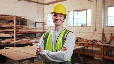 Buy stock photo Portrait, woodwork and happy man at factory with arms folded for manufacturing, joinery and ppe. Smile, carpenter and artisan with helmet for safety, confidence and about us in production industry