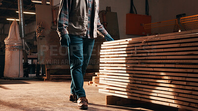 Buy stock photo Storage, wood and hands of man in workshop for inspection, quality assurance and timber. Walking, carpentry and person with material for manufacturing, lumber production and woodworking for furniture