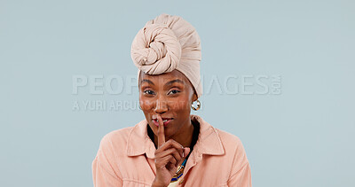 Buy stock photo Whisper, portrait and black woman with secret for confidential information on a studio background. Female person, silencer or quiet with finger on lips for mysterious vendetta, rumor or hidden agenda