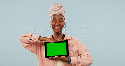 Buy stock photo Happy, portrait or black woman with tablet green screen for marketing on a studio background. Female person, user or smile with technology display for UX, UI or advertising app on mockup space