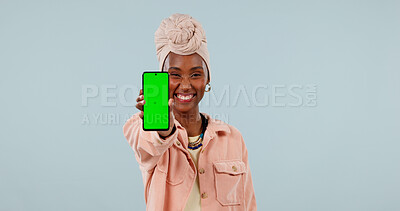 Buy stock photo Happy, portrait and black woman with phone green screen for marketing on a studio background. Female person, user or smile with mobile smartphone display for UX, UI or advertising app on mockup space